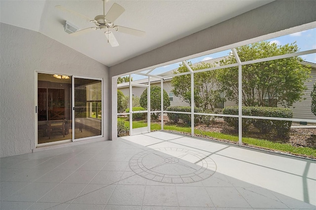 2104 Gerardo Ave, The Villages, FL 32159 - unfurnished sunroom with vaulted ceiling, a ceiling fan, and plenty of natural light