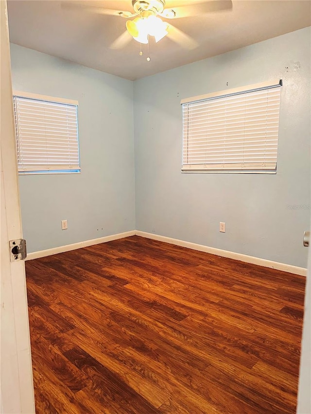 679 Ave Q SE, Winter Haven, FL 33880 - empty room with wood finished floors and ceiling fan