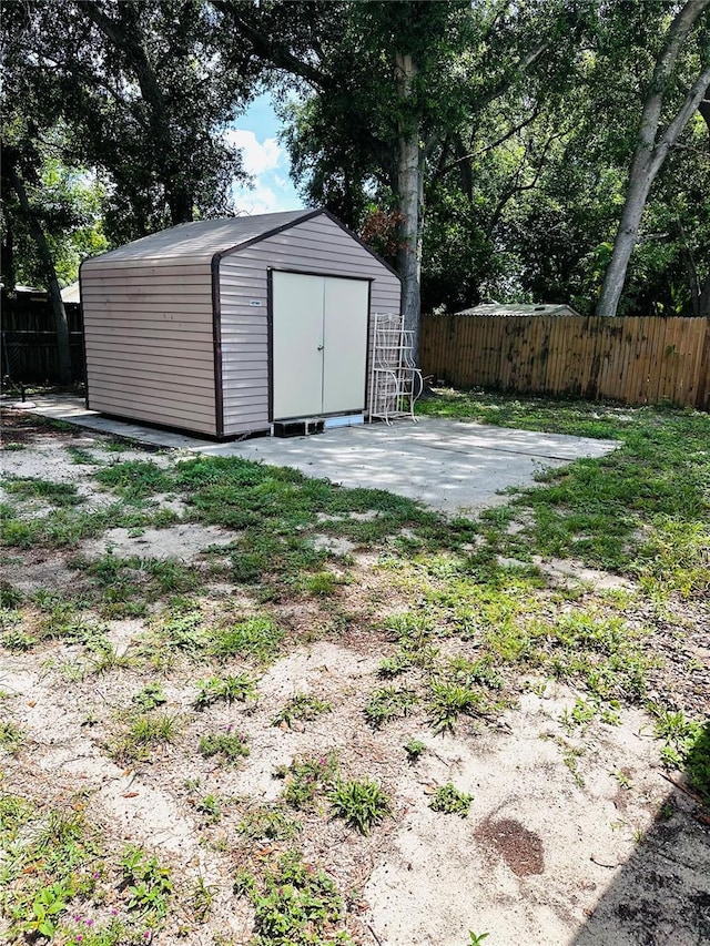 679 Ave Q SE, Winter Haven, FL 33880 - view of shed with a fenced backyard