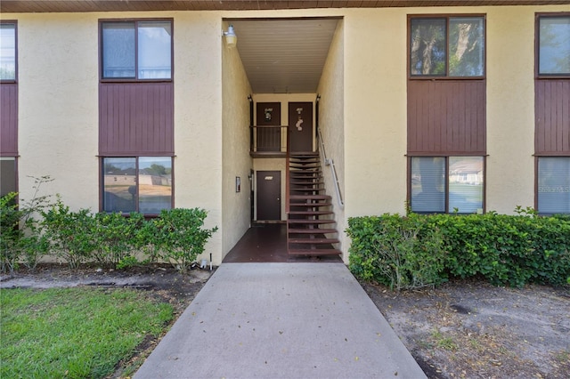 504 Silver Crse Unit A, Ocala, FL 34472 - view of exterior entry featuring stucco siding