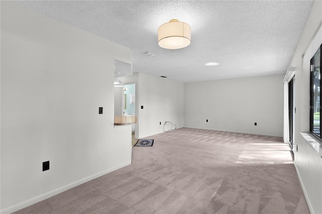 504 Silver Crse Unit A, Ocala, FL 34472 - carpeted empty room with a textured ceiling and baseboards