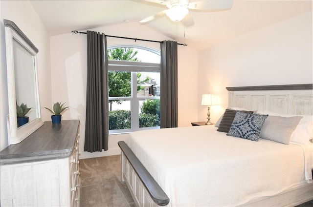 6301 Danielson Loop, The Villages, FL 32163 - bedroom featuring vaulted ceiling, light carpet, and a ceiling fan