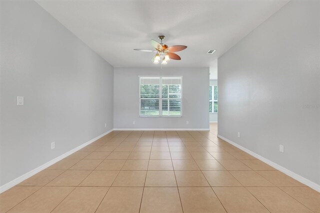2745 Shearwater St, Clermont, FL 34711 - spare room with ceiling fan and light tile patterned floors
