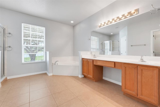 2745 Shearwater St, Clermont, FL 34711 - bathroom featuring a shower stall, double vanity, a garden tub, and tile patterned floors