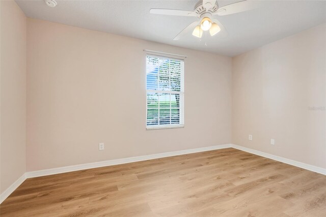 2745 Shearwater St, Clermont, FL 34711 - empty room with light wood-style flooring and a ceiling fan