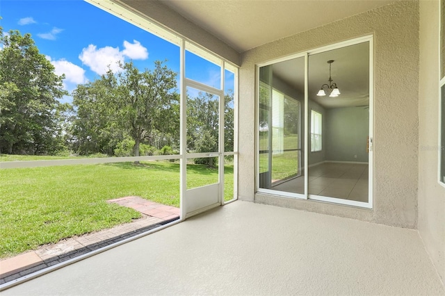 2745 Shearwater St, Clermont, FL 34711 - unfurnished sunroom featuring a chandelier