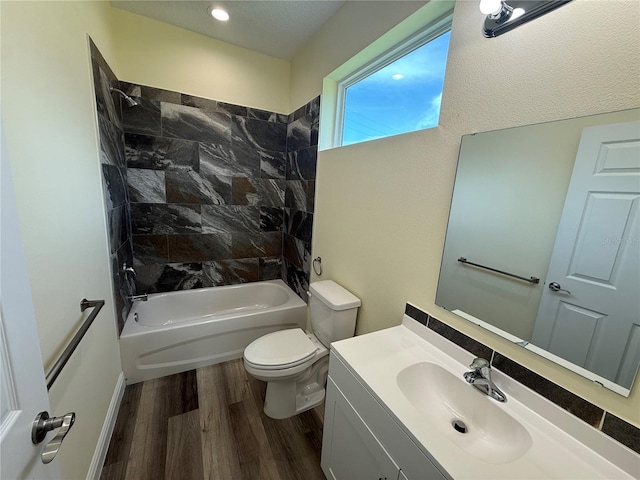 501 N Simpson St, Mount Dora, FL 32757 - full bathroom featuring wood finished floors, shower / bathtub combination, and vanity