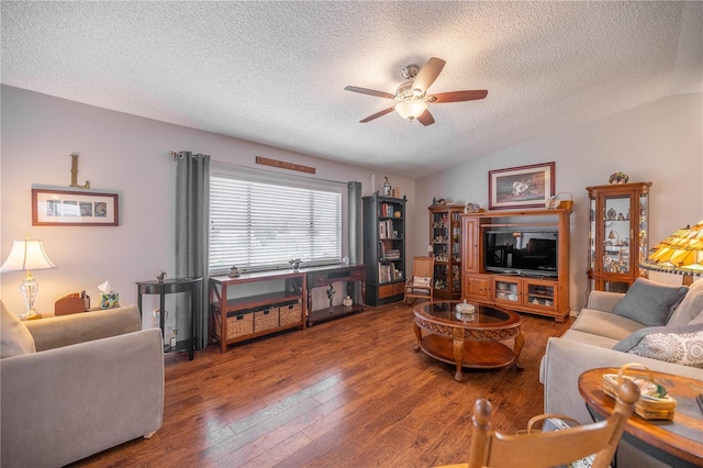 17533 SE 96th Ct, Summerfield, FL 34491 - living room featuring ceiling fan, vaulted ceiling, a textured ceiling, and hardwood / wood-style floors