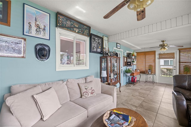 17533 SE 96th Ct, Summerfield, FL 34491 - living area featuring ceiling fan, tile patterned floors, and a textured ceiling