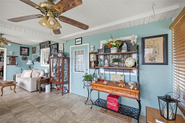 17533 SE 96th Ct, Summerfield, FL 34491 - living room featuring ceiling fan, healthy amount of natural light, and beamed ceiling