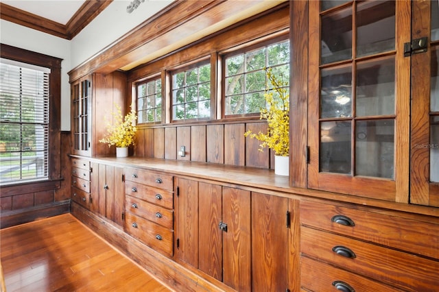263 NE 1st St, Webster, FL 33597 - detailed view of wood finished floors, ornamental molding, and wood walls