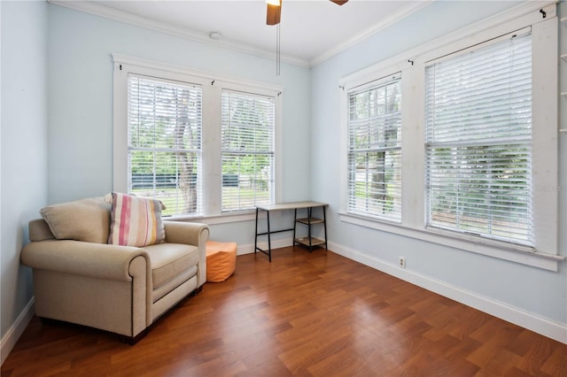 263 NE 1st St, Webster, FL 33597 - living area with ornamental molding, a ceiling fan, wood finished floors, and baseboards