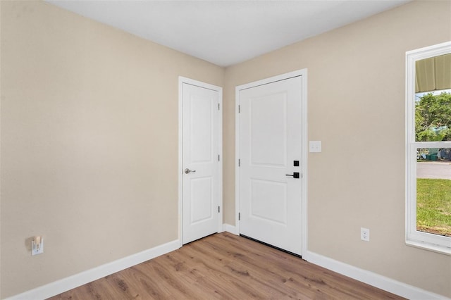 4 Kristin Ln, Eustis, FL 32726 - foyer with baseboards and light wood finished floors