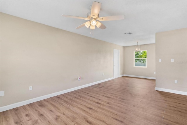 4 Kristin Ln, Eustis, FL 32726 - spare room with light wood-style floors, baseboards, and ceiling fan