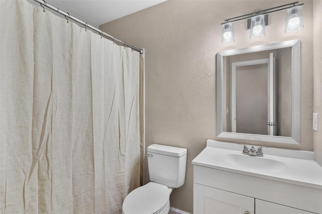 4 Kristin Ln, Eustis, FL 32726 - bathroom featuring vanity, toilet, and a textured wall
