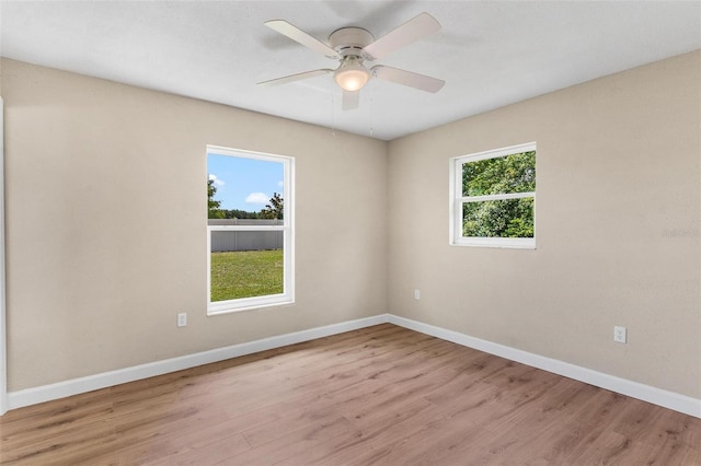 4 Kristin Ln, Eustis, FL 32726 - unfurnished room featuring wood finished floors, baseboards, and ceiling fan