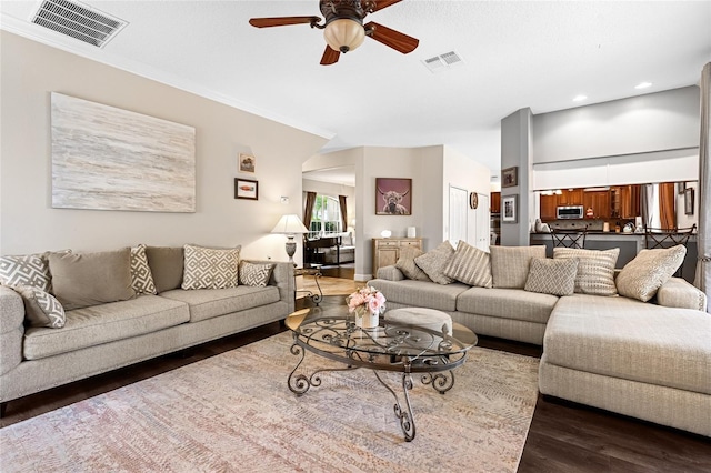 5144 Rishley Run Way, Mount Dora, FL 32757 - living room with ceiling fan, dark wood-type flooring, recessed lighting, and ornamental molding