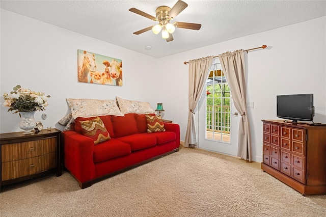 5144 Rishley Run Way, Mount Dora, FL 32757 - living room with a ceiling fan, light colored carpet, and a textured ceiling