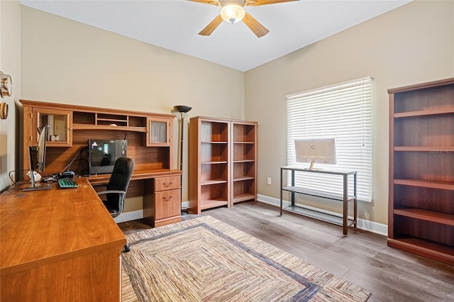5144 Rishley Run Way, Mount Dora, FL 32757 - home office featuring a ceiling fan, wood finished floors, and baseboards