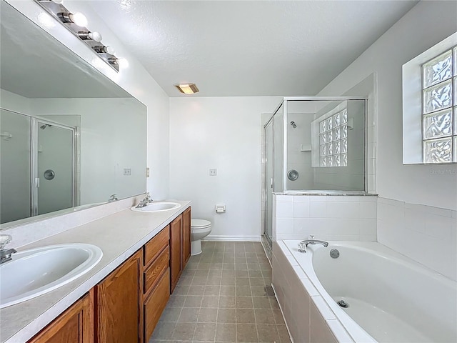 439 Gentle Breeze Dr, Minneola, FL 34715 - full bath with a shower stall, a garden tub, toilet, double vanity, and tile patterned floors