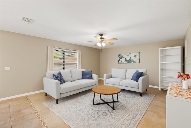 800 Daybreak Dr, Fruitland Park, FL 34731 - living area with light tile patterned floors and a ceiling fan