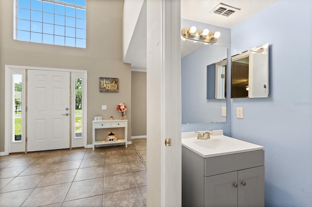 800 Daybreak Dr, Fruitland Park, FL 34731 - bathroom with vanity and tile patterned flooring