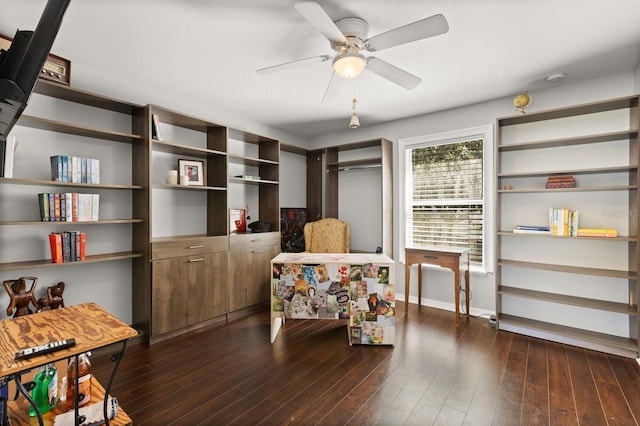 800 Daybreak Dr, Fruitland Park, FL 34731 - home office featuring a ceiling fan and dark wood finished floors