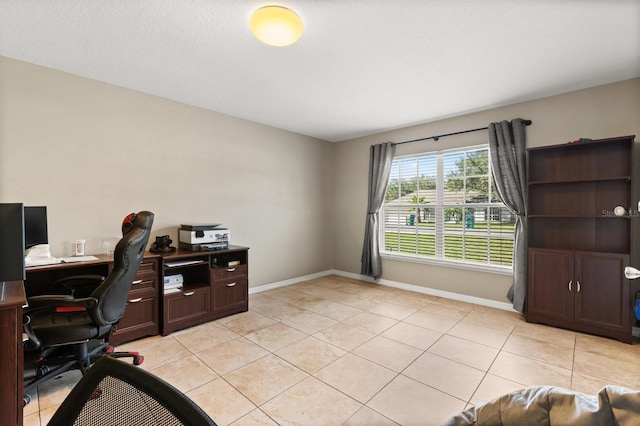800 Daybreak Dr, Fruitland Park, FL 34731 - home office with light tile patterned flooring and baseboards