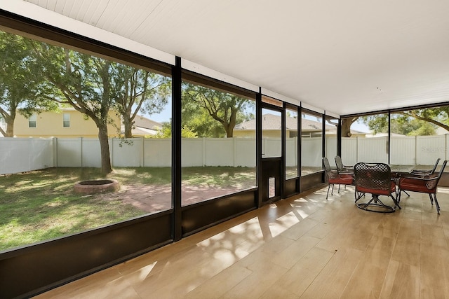 800 Daybreak Dr, Fruitland Park, FL 34731 - sunroom / solarium with wood finished floors and healthy amount of natural light