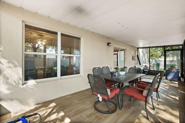 800 Daybreak Dr, Fruitland Park, FL 34731 - sunroom with outdoor dining space