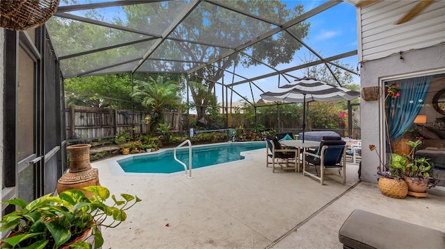 1130 Woodsong Way, Clermont, FL 34714 - view of pool with a patio area, a fenced backyard, and glass enclosure