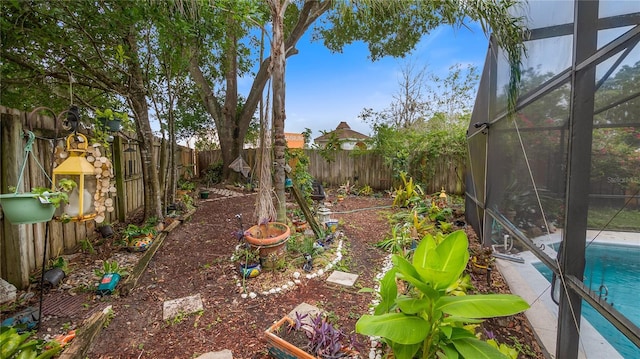 1130 Woodsong Way, Clermont, FL 34714 - fenced backyard with a lanai