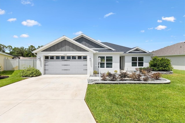 4157 Tiedemann Loop, The Villages, FL 32163 - ranch-style house with board and batten siding, an attached garage, driveway, and stucco siding