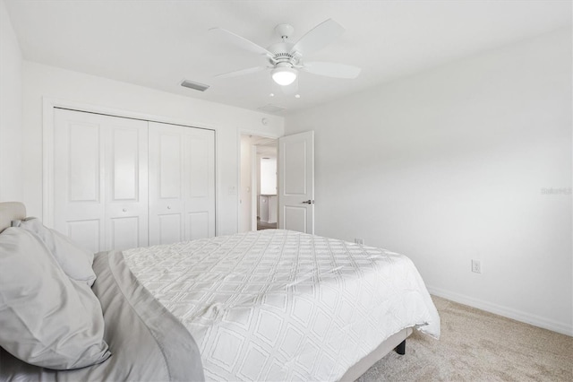 4157 Tiedemann Loop, The Villages, FL 32163 - carpeted bedroom with baseboards, a closet, and a ceiling fan
