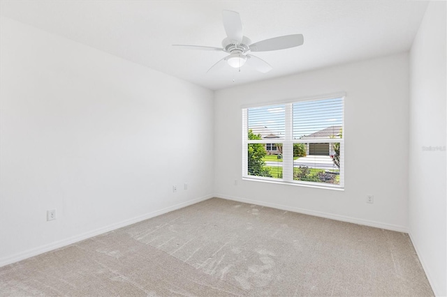 4157 Tiedemann Loop, The Villages, FL 32163 - unfurnished room featuring light carpet, baseboards, and a ceiling fan