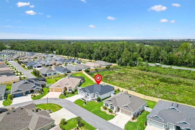 4157 Tiedemann Loop, The Villages, FL 32163 - aerial view of residential area with a forest
