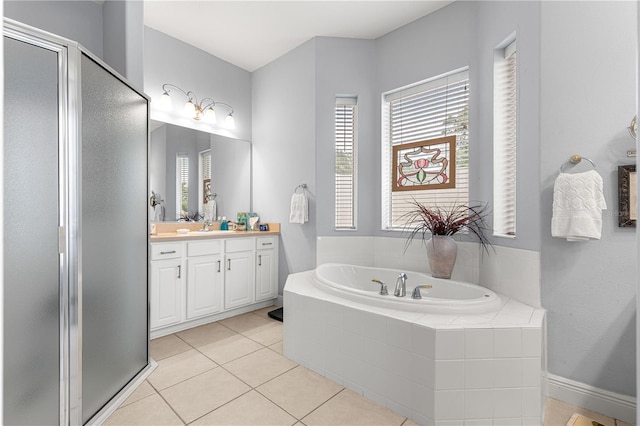 39145 Treeline Dr, Lady Lake, FL 32159 - bathroom featuring vanity, a bath, a shower stall, and tile patterned floors