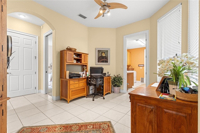 39145 Treeline Dr, Lady Lake, FL 32159 - office space with a ceiling fan, arched walkways, and light tile patterned floors