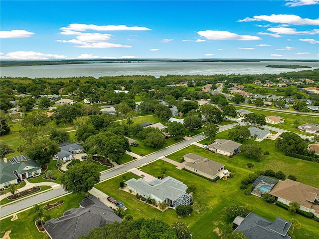 39145 Treeline Dr, Lady Lake, FL 32159 - aerial view of property's location with a nearby body of water and nearby suburban area