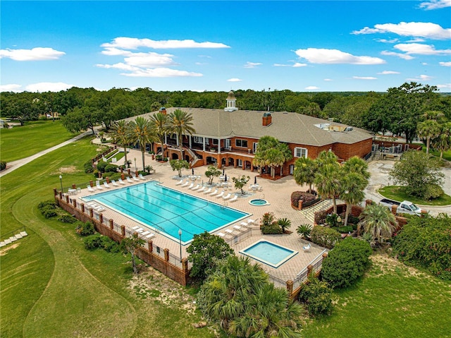 39145 Treeline Dr, Lady Lake, FL 32159 - community pool featuring a patio area