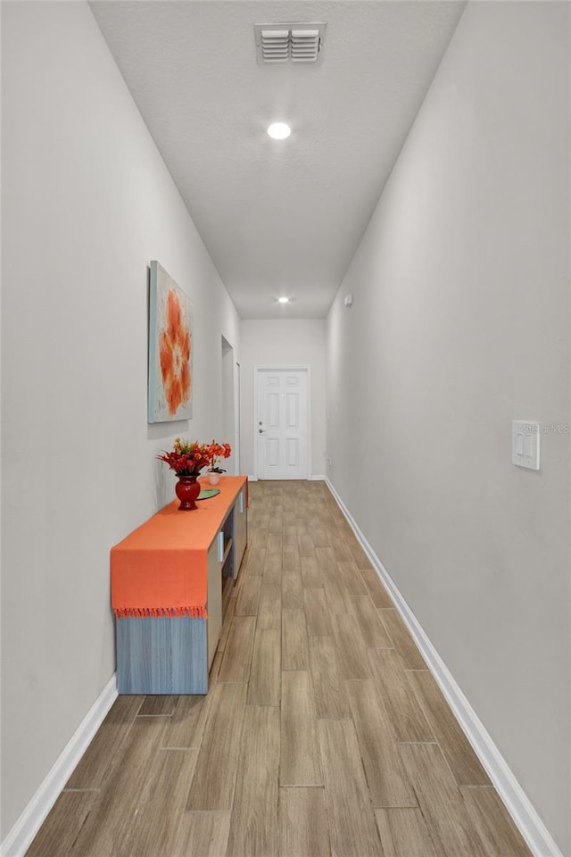 733 Citrus Reserve Blvd, Davenport, FL 33837 - hallway with wood finished floors and baseboards