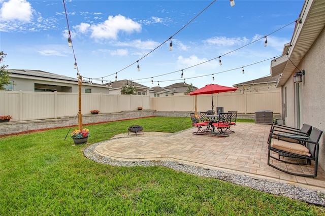 733 Citrus Reserve Blvd, Davenport, FL 33837 - view of yard featuring central AC unit and a patio
