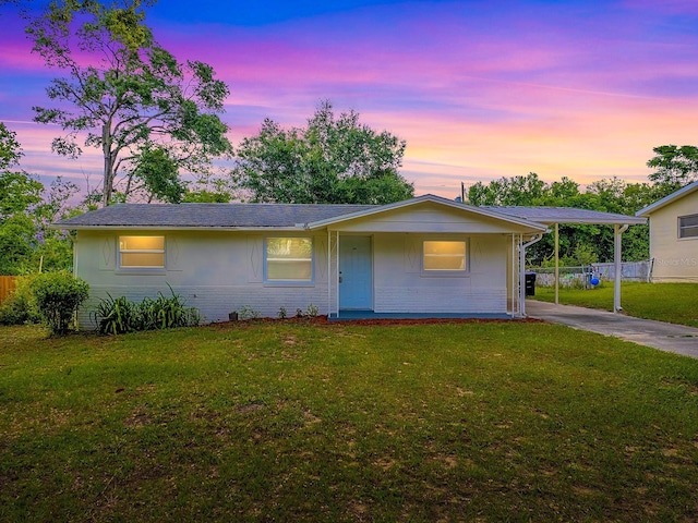 59 S Columbus St, Beverly Hills, FL 34465 - view of front of home featuring concrete driveway and brick siding