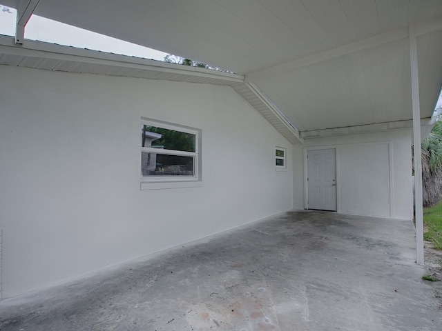 59 S Columbus St, Beverly Hills, FL 34465 - view of home's exterior with a patio and a carport