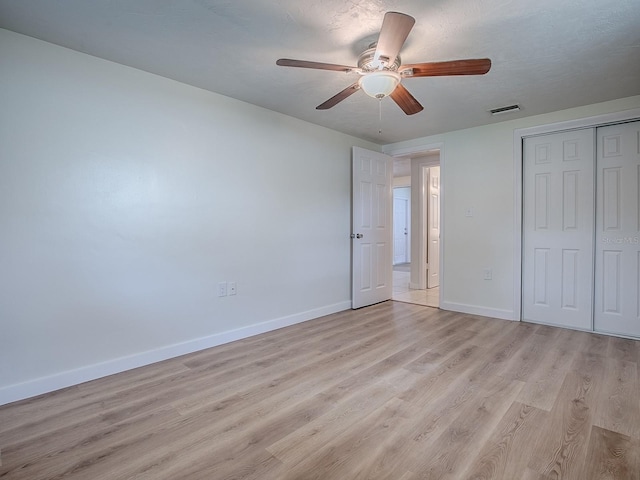 59 S Columbus St, Beverly Hills, FL 34465 - unfurnished bedroom featuring baseboards, light wood-style floors, a closet, and ceiling fan