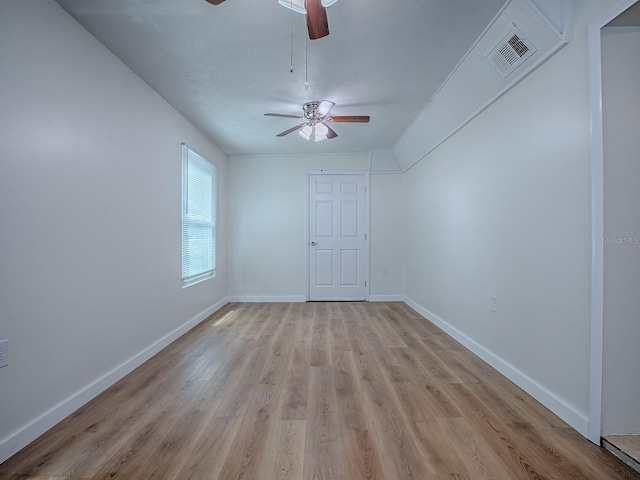 59 S Columbus St, Beverly Hills, FL 34465 - empty room with a ceiling fan, light wood-style flooring, and baseboards