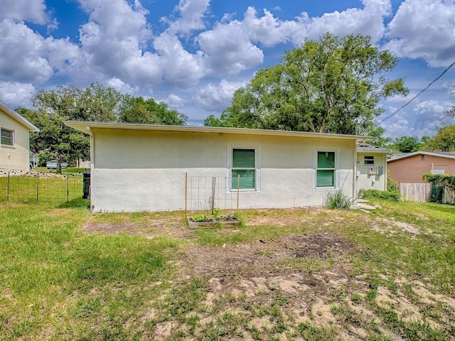 59 S Columbus St, Beverly Hills, FL 34465 - view of property exterior featuring stucco siding
