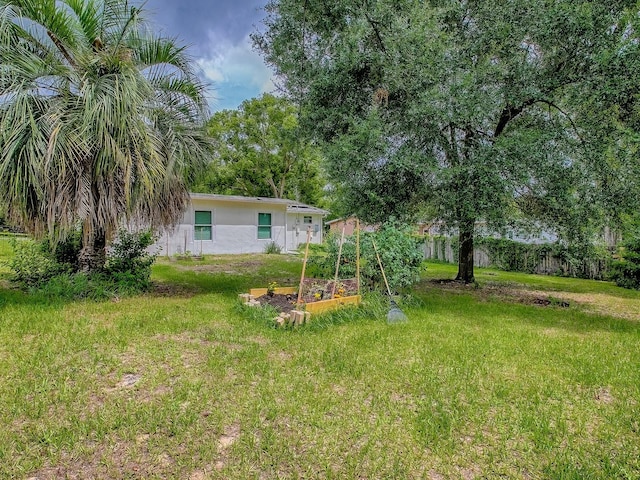59 S Columbus St, Beverly Hills, FL 34465 - view of yard featuring a garden