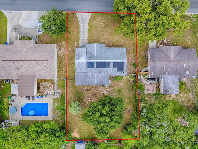 59 S Columbus St, Beverly Hills, FL 34465 - aerial view of property and surrounding area with property boundaries highlighted and a pool