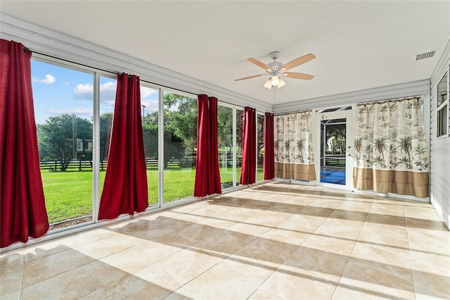 2557 Privada Dr, The Villages, FL 32162 - unfurnished sunroom with tile patterned flooring